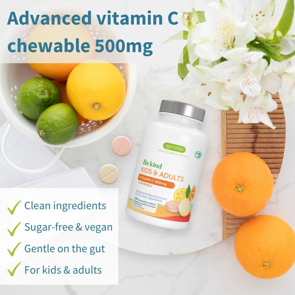 Vitamin C chewable supplement bottle with fruits and flowers on a white background