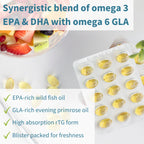 Supplement packaging with fish oil capsules and a bowl of fruit on a white background