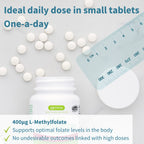 Vitamin supplement with tablets, jar, and ruler on a light gray background