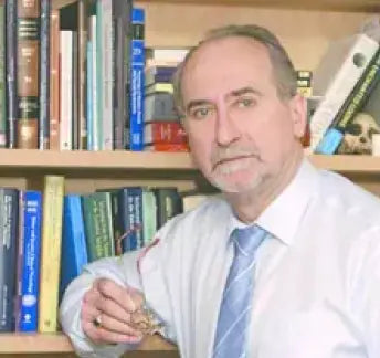 Dr Raymond Perrin