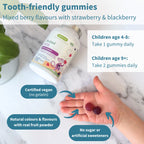 Vitamin gummies with a bottle labeled 'The Kind Kids' on a marble surface.