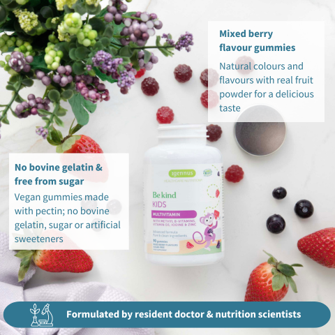Children's multivitamin gummies with mixed berries on a white background
