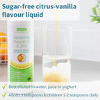 Liposomal Vitamin C & Zinc supplement with a glass of liquid being poured, on a light background.