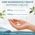 Hand holding two white pills with text about magnesium glycinate on a light background