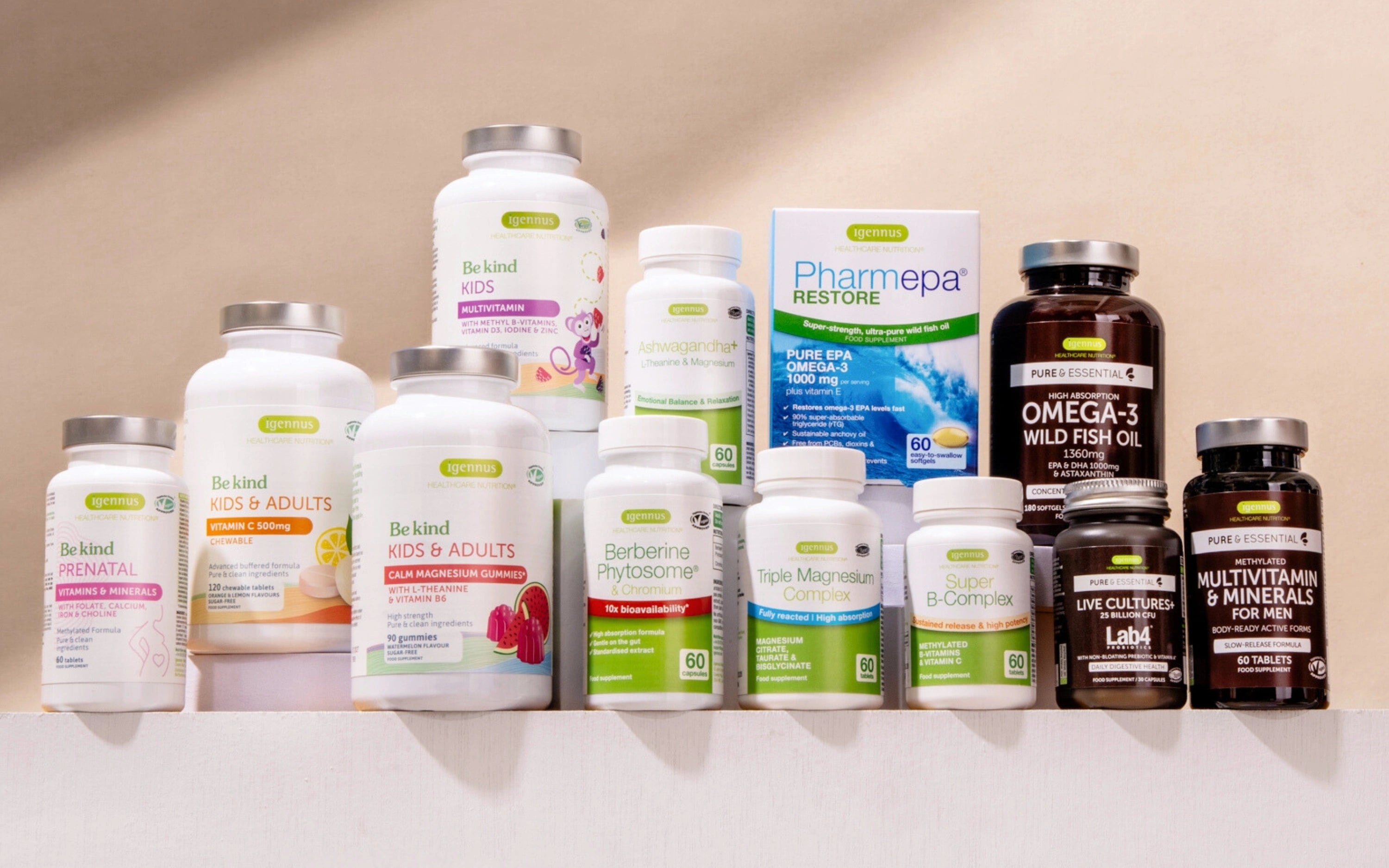 Assorted health supplements and vitamins on a white surface with a neutral background