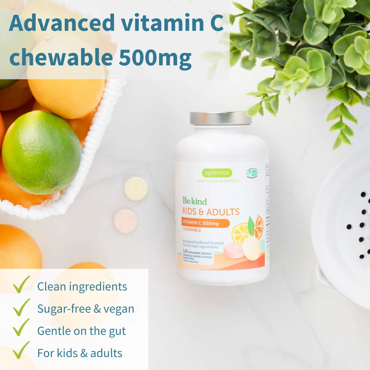 Vitamin C chewable supplement bottle with fruits and a plant on a light surface