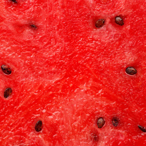 Close-up of a red watermelon with black seeds