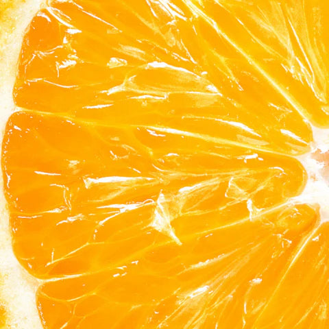 Close-up of a sliced orange with juicy interior