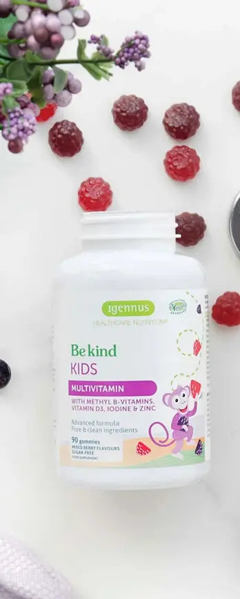 Bekind Kids multivitamin bottle with berries and flowers on a white background