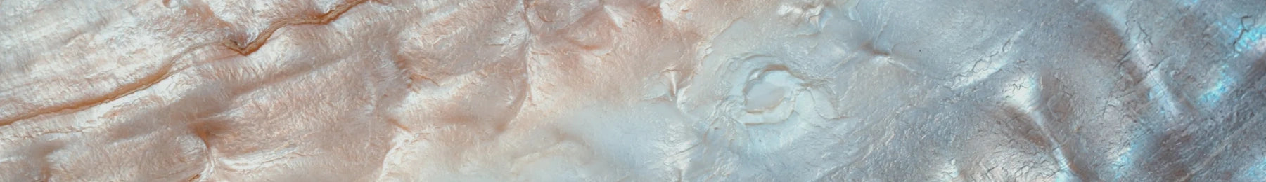 Close-up of textured surface with a gradient from beige to blue